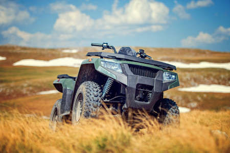 parked atv quad bikes extreme outdoor adventure conceptの写真素材