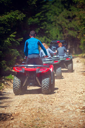 man riding atv vehicle on off road track ,people outdoor sport activitiies theme