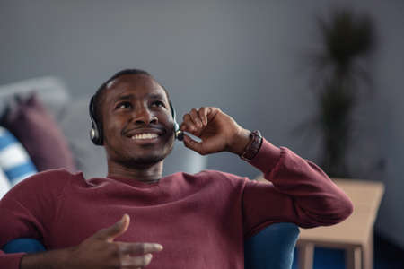 Customer Service agent in an startup office with laptop