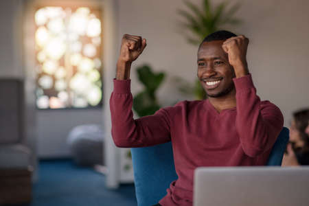 Close-up Of Person Typing On Laptop At startup office.の写真素材