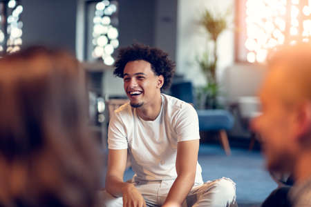 Coworking meeting. Startup team discussing new project together.の写真素材