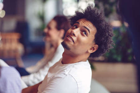 Coworking meeting. Startup team discussing new project together.の写真素材