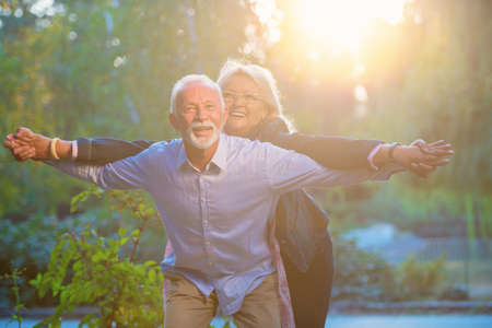 Happy senior couple in love. Park outdoors.