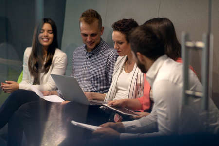 Multiracial young creative people in modern office. Group of young business people are working...