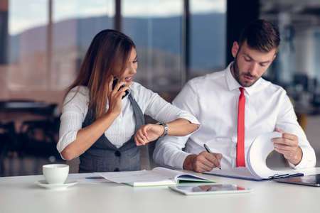 Business conflict. Business people arguing about document at the office
