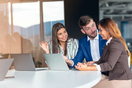 Group of business persons in discussion. Working together.の写真素材