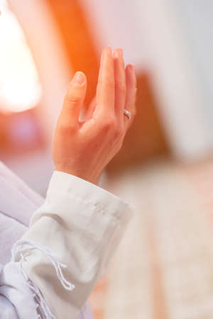 Religious muslim man praying. Islamic concept background
