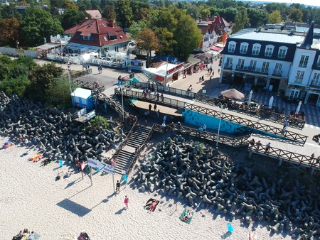 MIELNO, POLAND - 02 SEPTEMBER 2018 - Aerial view on sunny beach with tourists at baltic sea on Mielno cityのeditorial素材