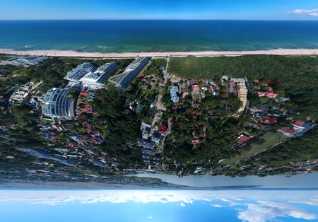 Aerial panorama view on tourist during summer vacation on beach at sea.