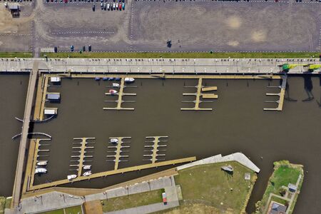 SZCZECIN, POLAND - 08 APRIL 2019 - Aerial view on Szczecin city, area of Szczecin Cargo Port with Yacht Marina at Dunczyca canalのeditorial素材