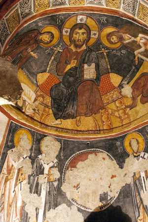 Frescoes on a wall of cave church , Goreme - Karanlik Kilise,Cappadocia Turkeyのeditorial素材