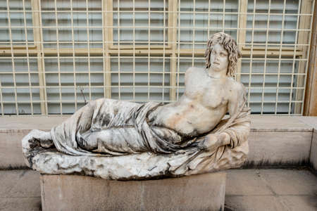 Sculpture and high reliefs at ancient sarcophagus or tomb in Aphrodisias.のeditorial素材