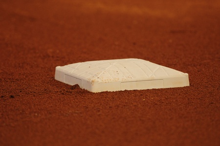baseball base and dirt on field at stadium