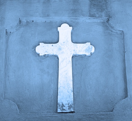 christian cross in blue to represent religionの写真素材
