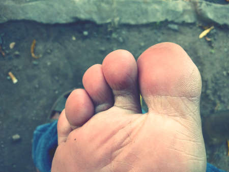 closeup of finger foot and toe. unusual angel shotの写真素材