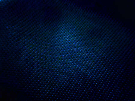 Abstract texture dark blue reflective background with dotted surface for design bannerの写真素材