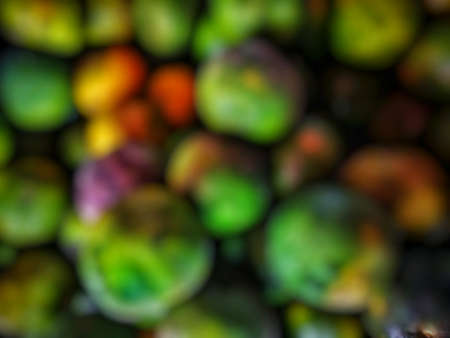 Blurred colorful natural vegetables fruits background.blurry defocus backgroundの写真素材