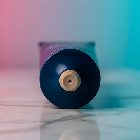 Close-up of cosmetic tube on white marble table with colorful backgroundの素材