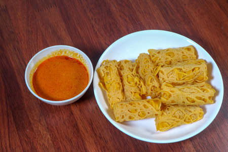 Roti Jala and Chicken Curry, traditional Malaysian Food