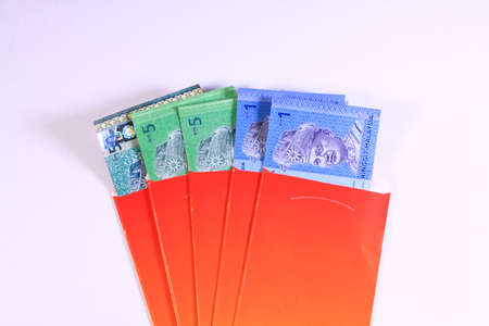 'Duit Raya' is money given from adult to children during Eid al-Fitr celebration in Malaysia.の写真素材