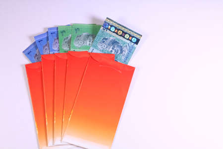 'Duit Raya' is money given from adult to children during Eid al-Fitr celebration in Malaysia.の写真素材