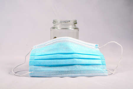 Surgical mask with rubber ear straps. Typical 3-ply surgical mask to cover the mouth and nose....