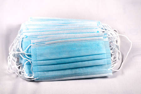 Surgical mask with rubber ear straps. Typical 3-ply surgical mask to cover the mouth and nose....