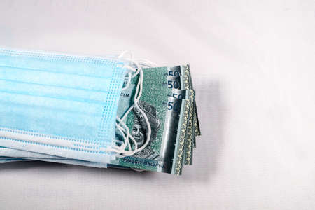 Face masks, the new world currency in Malaysia. Corona Cov19 crisis makes face mask to the most...