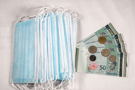 Face masks, the new world currency in Malaysia. Corona Cov19 crisis makes face mask to the most...