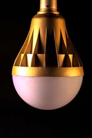 White led bulb on black background with copy space for advert. business idea concept.の写真素材