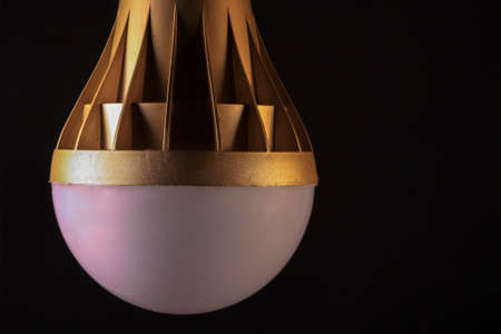 White led bulb on black background with copy space for advert. business idea concept.の写真素材