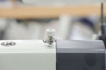 close-up sewing machine, automatic sewing machine, tinted image, selective focusingの写真素材