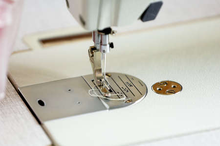 close-up sewing machine, automatic sewing machine, tinted image, selective focusingの写真素材