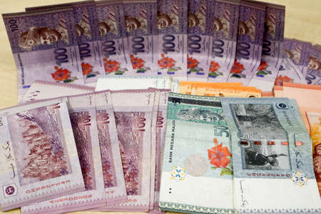 Malaysia currency of Malaysian ringgit banknotes .Paper money of ten ringgit, twenty ringgit, fifty ringgit and one hundred notes on closeup. Financial concept. selective focus and soft focusの写真素材