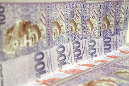 Malaysia currency of Malaysian ringgit banknotes .Paper money of ten ringgit, twenty ringgit, fifty ringgit and one hundred notes on closeup. Financial concept. selective focus and soft focusの写真素材