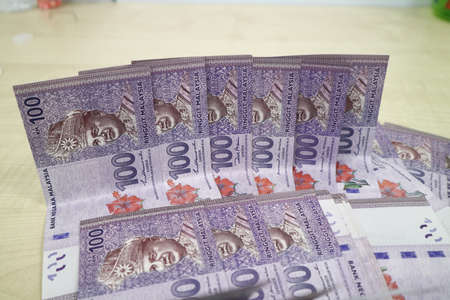Malaysia currency of Malaysian ringgit banknotes .Paper money of ten ringgit, twenty ringgit, fifty ringgit and one hundred notes on closeup. Financial concept. selective focus and soft focusの写真素材
