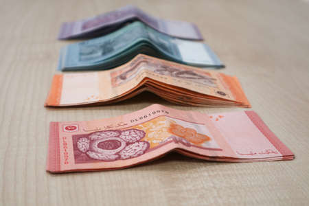 Malaysia currency of Malaysian ringgit banknotes .Paper money of ten ringgit, twenty ringgit, fifty ringgit and one hundred notes on closeup. Financial concept. selective focus and soft focusの写真素材