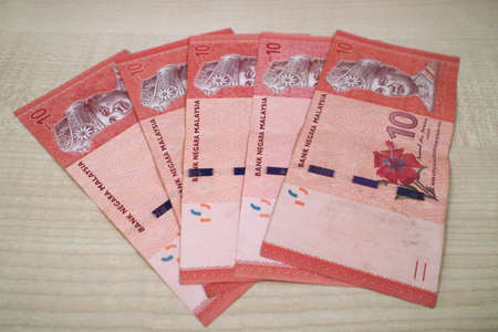Malaysia currency of Malaysian ringgit banknotes .Paper money of ten ringgit, twenty ringgit, fifty ringgit and one hundred notes on closeup. Financial concept. selective focus and soft focusの写真素材