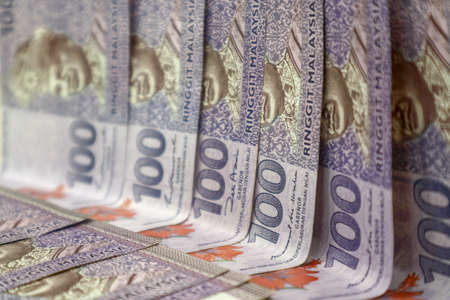 Malaysia currency of Malaysian ringgit banknotes .Paper money of ten ringgit, twenty ringgit, fifty ringgit and one hundred notes on closeup. Financial concept. selective focus and soft focusの写真素材