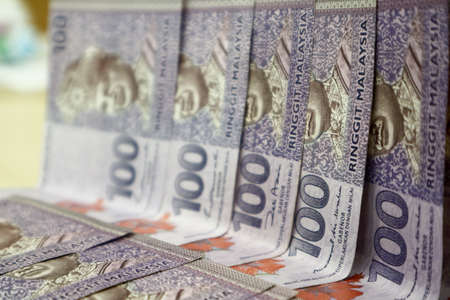 Malaysia currency of Malaysian ringgit banknotes .Paper money of ten ringgit, twenty ringgit, fifty ringgit and one hundred notes on closeup. Financial concept. selective focus and soft focusの写真素材