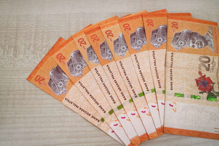Malaysia currency of Malaysian ringgit banknotes .Paper money of ten ringgit, twenty ringgit, fifty ringgit and one hundred notes on closeup. Financial concept. selective focus and soft focusの写真素材