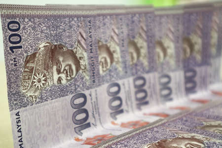 Malaysia currency of Malaysian ringgit banknotes .Paper money of ten ringgit, twenty ringgit, fifty ringgit and one hundred notes on closeup. Financial concept. selective focus and soft focusの写真素材