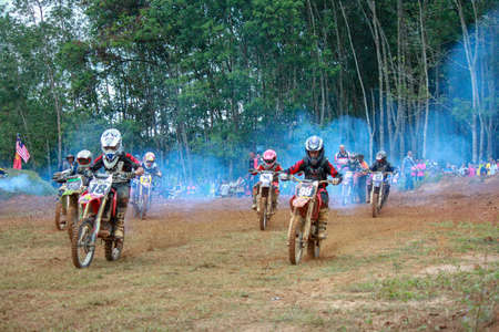 Alor Setar kedah Malaysia, 8 November 2015 -Unidentified motocross riders perform on the competes at Malaysia motocross championship 2015 first round onのeditorial素材