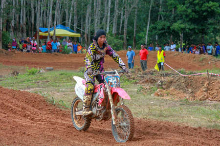 Alor Setar kedah Malaysia, 8 November 2015 -Unidentified motocross riders perform on the competes at Malaysia motocross championship 2015 first round onのeditorial素材