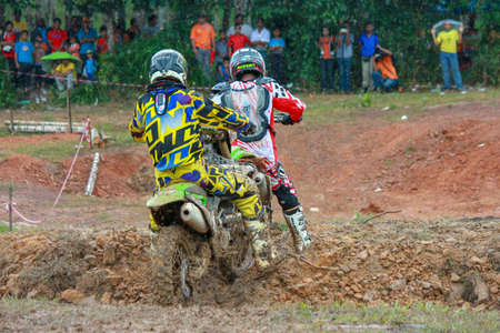 Alor Setar kedah Malaysia, 8 November 2015 -Unidentified motocross riders perform on the competes at Malaysia motocross championship 2015 first round onのeditorial素材