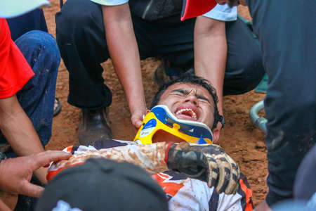 Alor Setar kedah Malaysia, 8 November 2015 -Unidentified motocross riders perform on the competes at Malaysia motocross championship 2015 first round onのeditorial素材