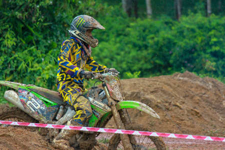 Alor Setar kedah Malaysia, 8 November 2015 -Unidentified motocross riders perform on the competes at Malaysia motocross championship 2015 first round onのeditorial素材