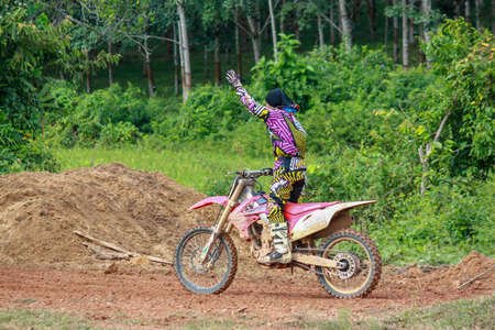 Alor Setar kedah Malaysia, 8 November 2015 -Unidentified motocross riders perform on the competes at Malaysia motocross championship 2015 first round onのeditorial素材