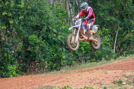Alor Setar kedah Malaysia, 8 November 2015 -Unidentified motocross riders perform on the competes at Malaysia motocross championship 2015 first round onのeditorial素材
