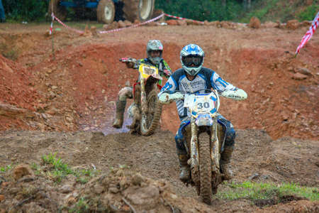 Alor Setar kedah Malaysia, 8 November 2015 -Unidentified motocross riders perform on the competes at Malaysia motocross championship 2015 first round onのeditorial素材